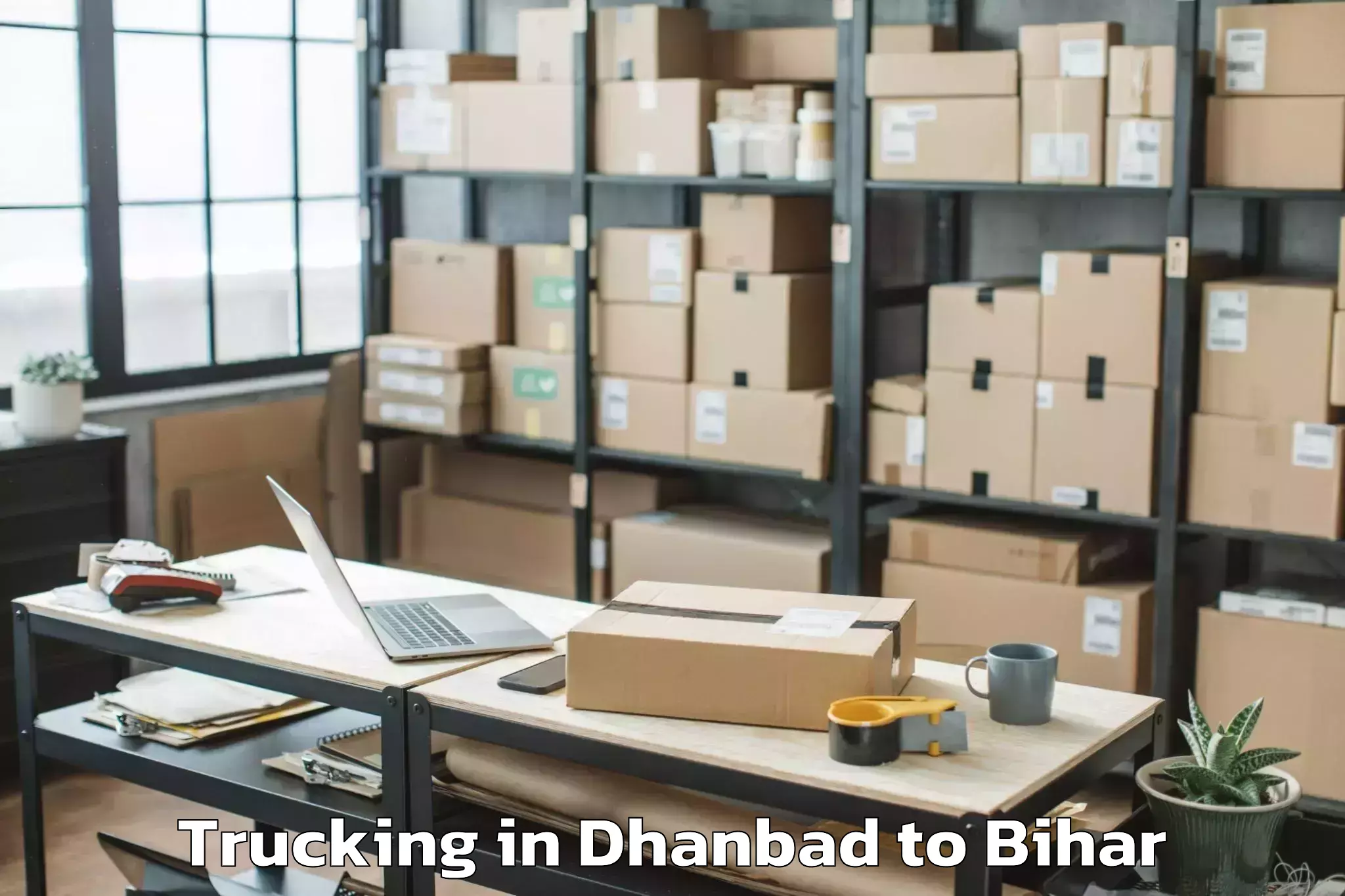 Book Dhanbad to Cheria Bariarpur Trucking Online